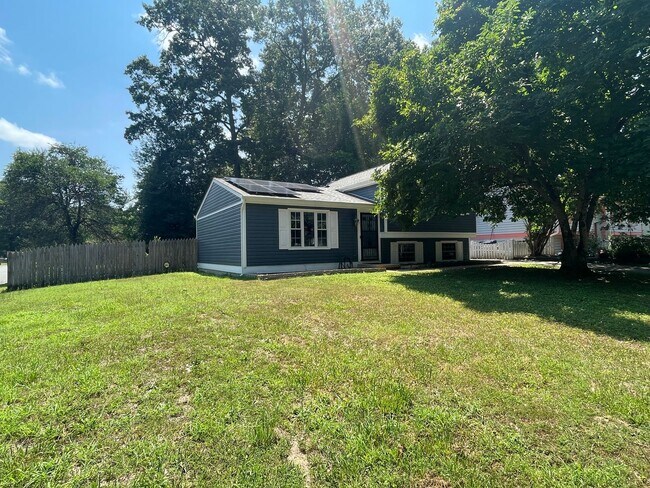 Building Photo - Updated Tri-Level home with solar panels!