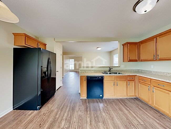 Building Photo - 6620 Hollister Ln