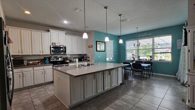 Building Photo - Preserve at Crown Point Home with Fenced B...