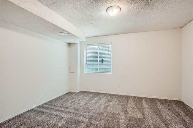 Building Photo - 10569 W Dartmouth Ave