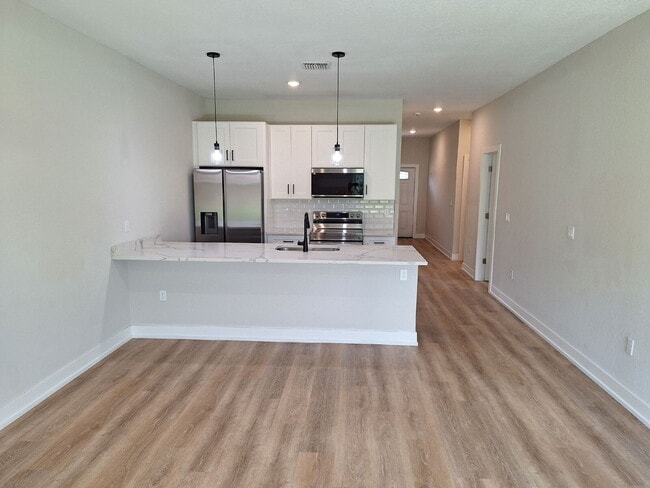 Building Photo - Available with ZERO DEPOSIT MOVE-IN!
