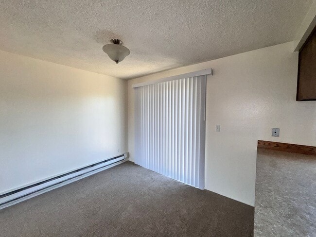 Building Photo - Single-Level 2 Bedroom / 1 Bath Triplex Unit on 1/2 Acre in East Bend  -  Move-In Special * up to...