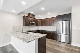 1BR, 1.5BA - 1,184SF - Kitchen - Tumblerock Luxury Apartments