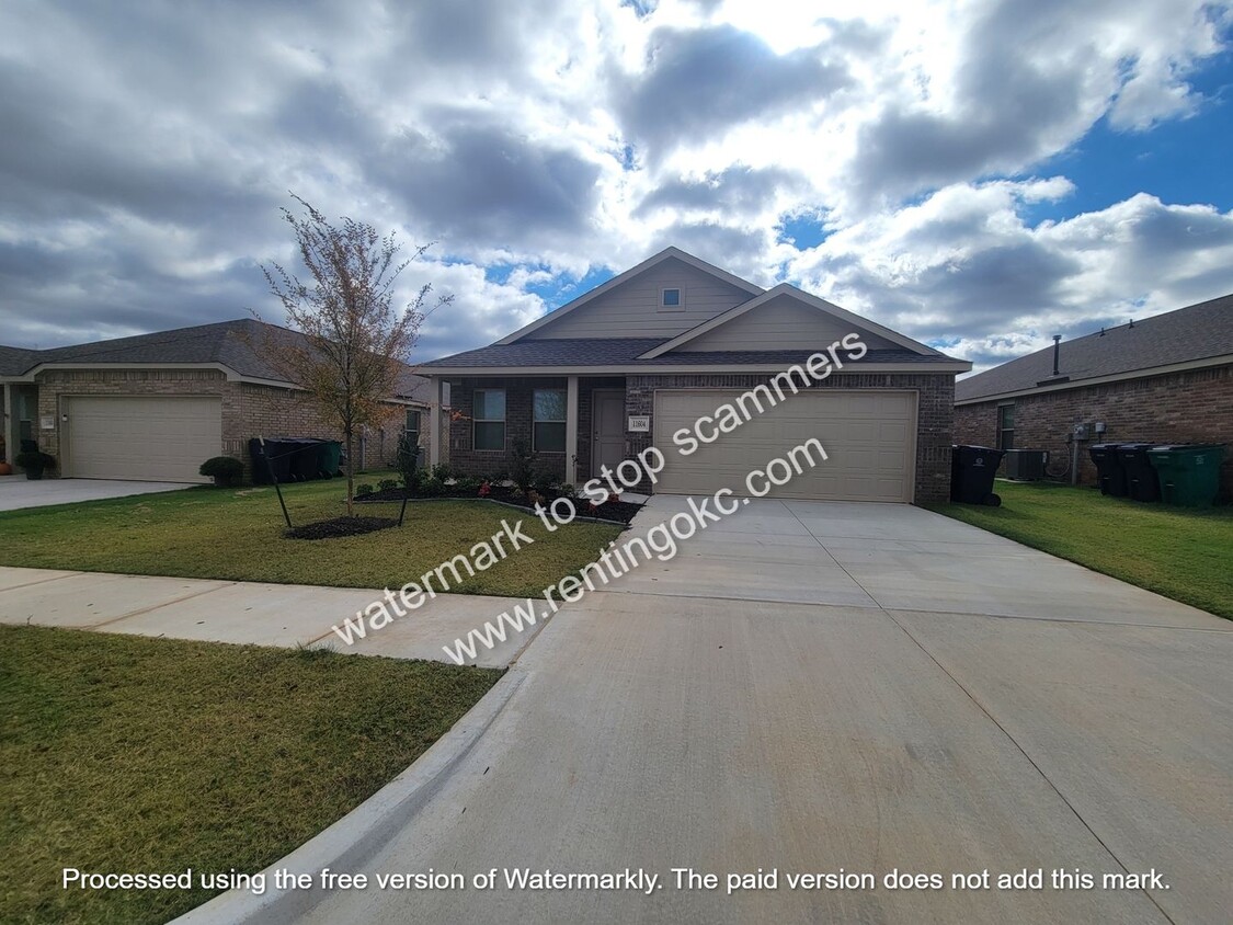 Primary Photo - Brand NEW home in Mustang! Community pool!