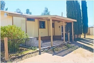 Building Photo - 9764 Wild Rose Rd