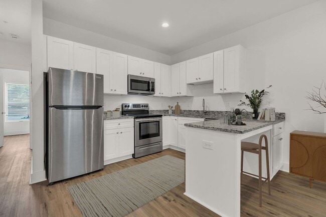 Building Photo - Simple living?  We got you.  $1150/mo wate...