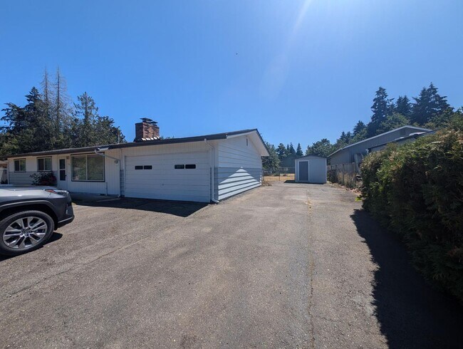 Building Photo - Rambler with large yard and storage shed...
