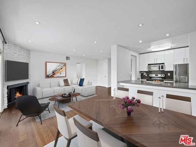Wide Angle view of Dinning/Kitchen/Living room - 141 S Clark Dr