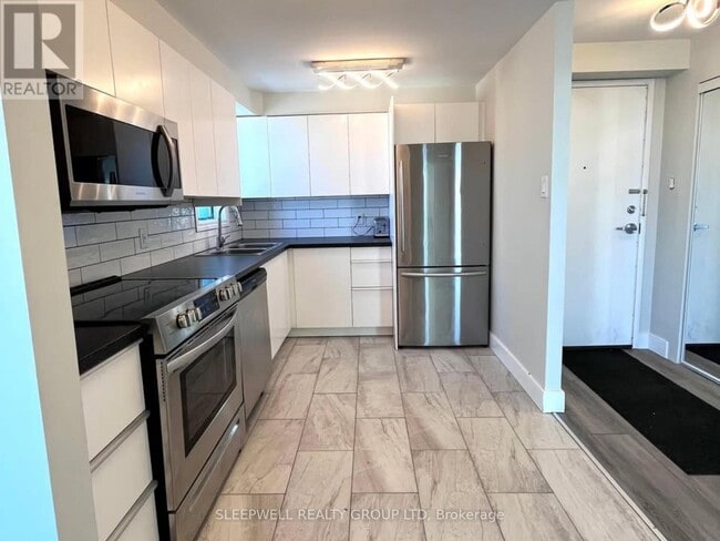 Photo du bâtiment - 1440 Heron Rd