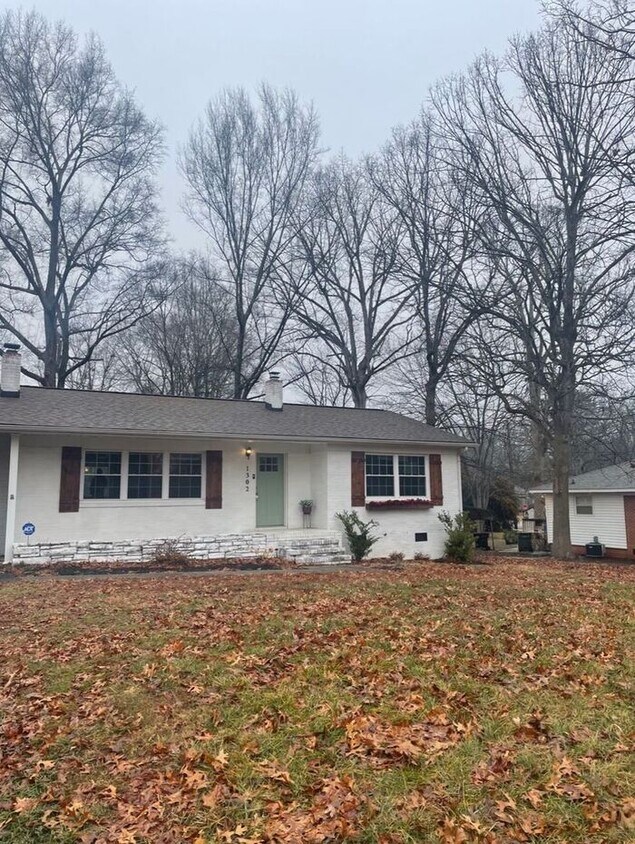 Building Photo - Charming Brick Ranch with Massive Privacy Yard