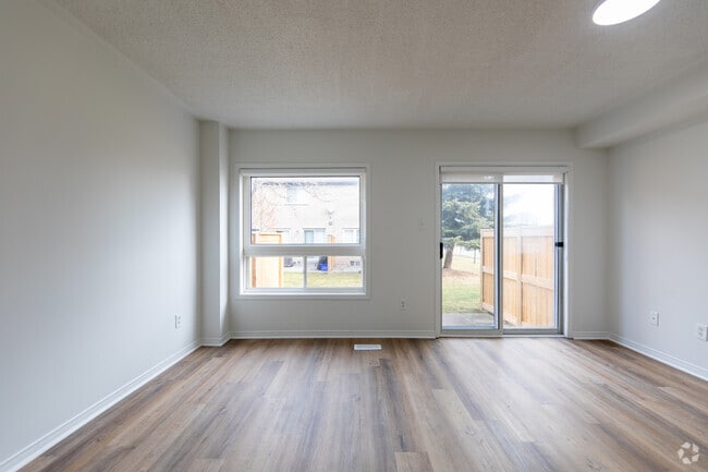 3BR, 3BA - 1,393SF - Living Room - Erin Centre Village