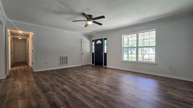 Building Photo - 5607 Whispering Pines Dr