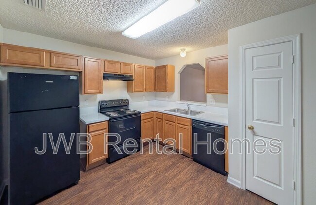 Building Photo - 8479 McGirts Village Ln