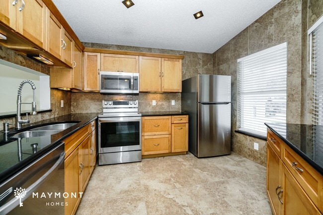 Foto del edificio - 5874 Woodpoint Terrace