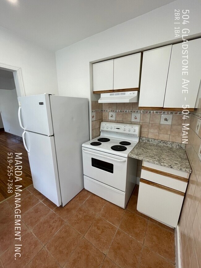 Photo du bâtiment - BRIGHT & SPACIOUS 2 BED / 1 BATH UNIT IN OLD WALKERVILLE+ HYDRO & GAS