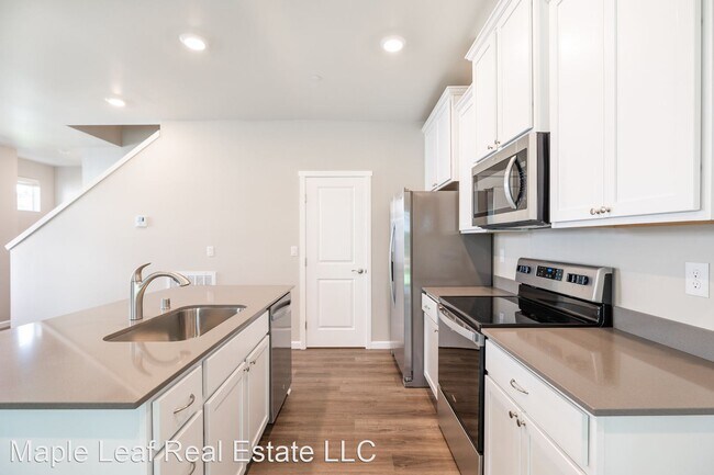 Foto del edificio - 4 br, 2.5 bath House - 8724 E Gilman Ave