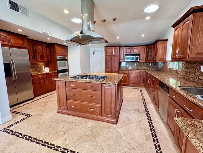 Building Photo - Beautifully remodeled 4 bedroom house in prime Woodland Hills Neighborhood