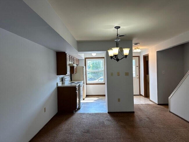 Building Photo - Welcome to this Charming 2-bedroom, 1.5-ba...