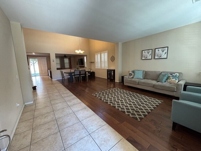 Building Photo - Grand 4-Bedroom Home with Entertainer's Yard in Gated River Village!