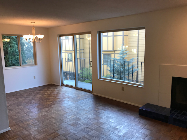 Windows in a one corner of the dining/living area. - 4511 Greenwood Ave N