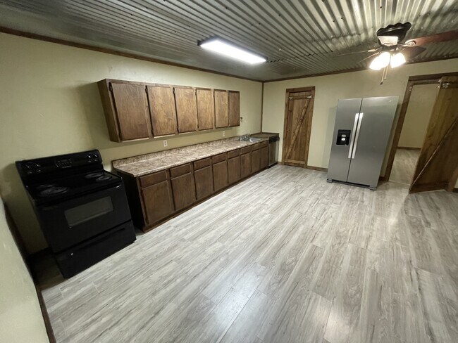 Foto del edificio - 6980 Farm Rd 115