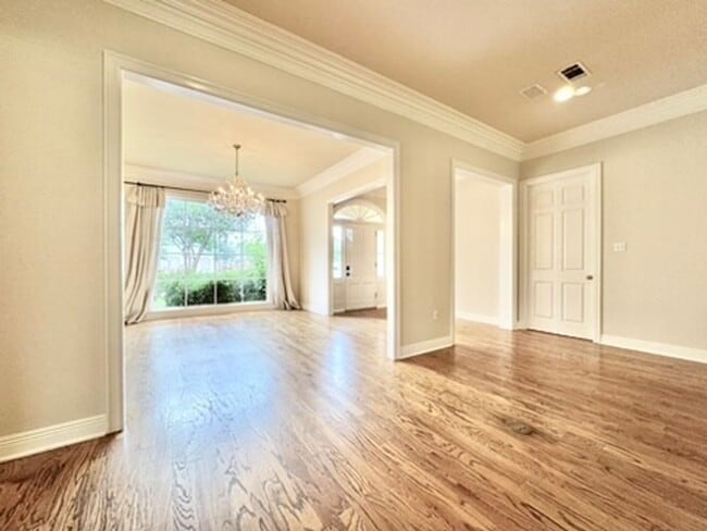 Building Photo - Spacious 4-Bedroom with Fireplace & Fenced...