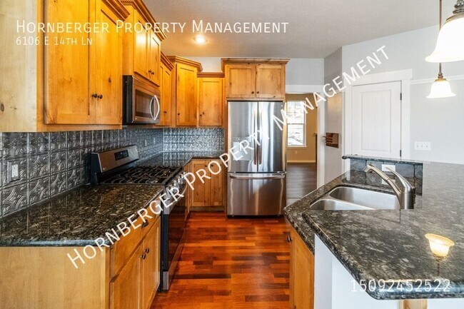 Foto del edificio - 6106 E 14th Ln