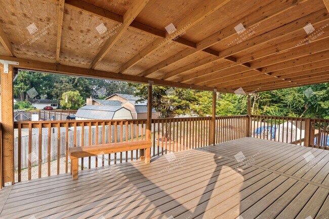 Building Photo - 4BR + Finished Heated Garage | Fenced 1/4 Acre | Mins to JBLM