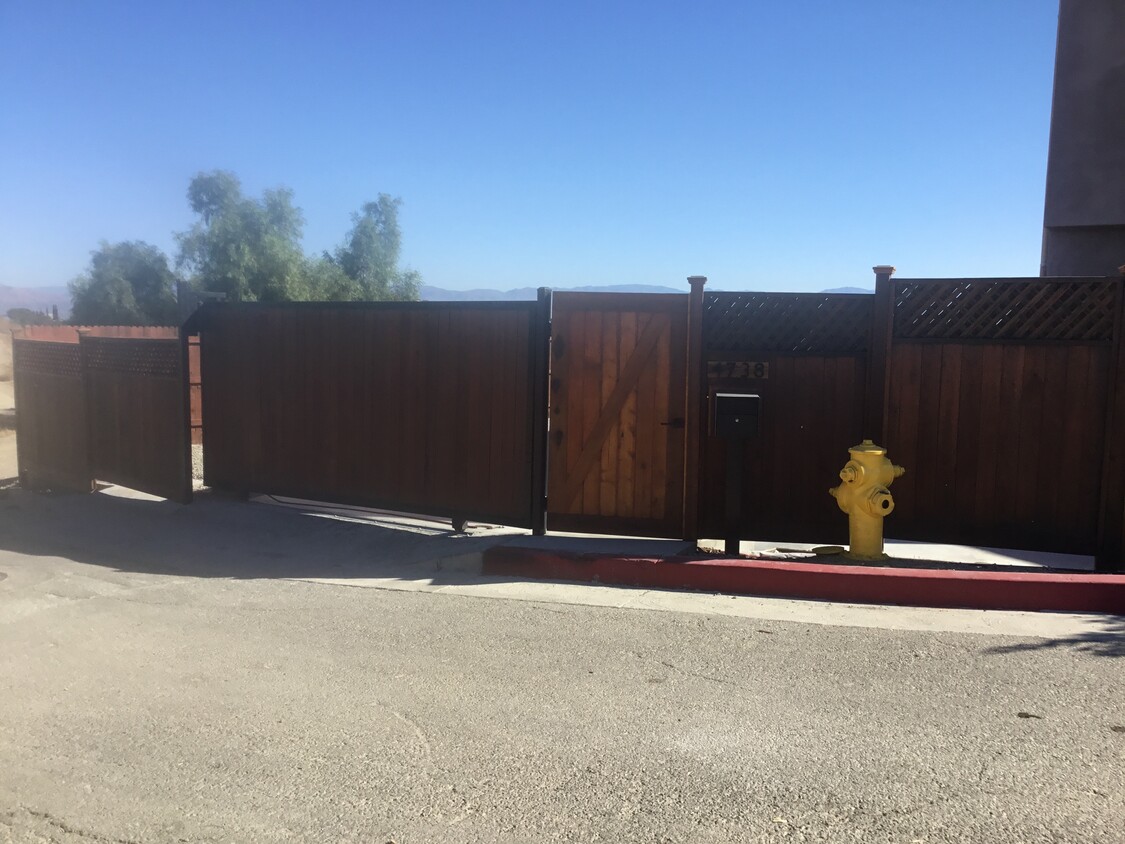 entry from street thru private automatic sliding gate and pedestrian gate - 4738 San Sebastian Dr