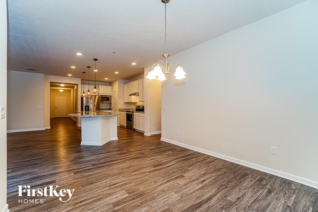 Building Photo - 6654 Cat Singer Cir