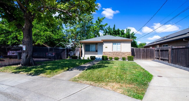 Building Photo - ALF OFF One Month’s Rent! Updated 3BR Home with Garage & Yard – Prime Sacramento Location