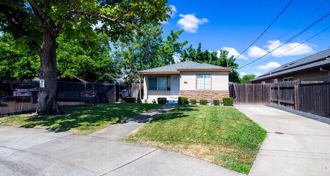 Photo - ALF OFF One Month’s Rent! Updated 3BR Home with Garage & Yard – Prime Sacramento Location