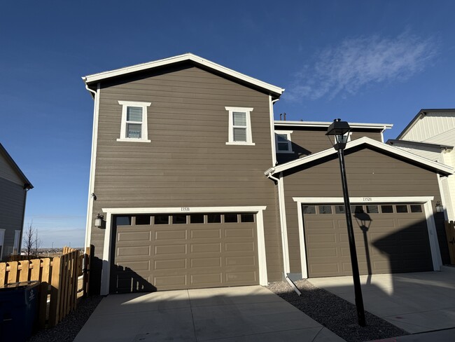 Two car garage from Alley - 13518 E 111th Ave