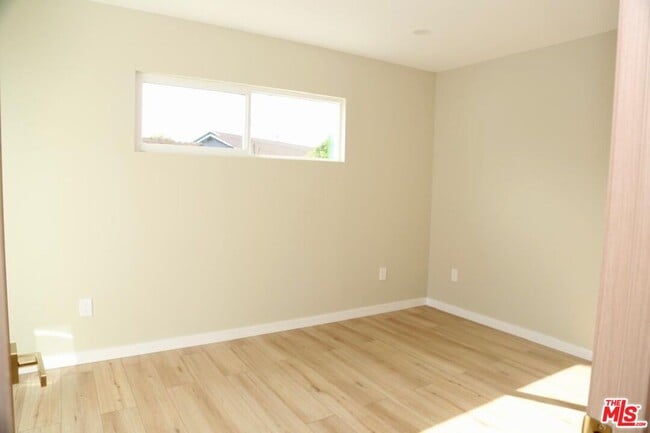 Building Photo - 8235 Alcove Ave