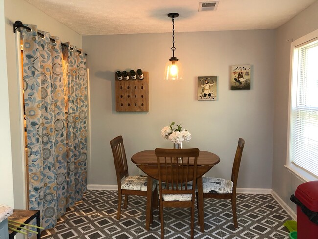 Kitchen has updated dining space.washer and dryer included with laundry room. Both - 1138 Timothy Ave