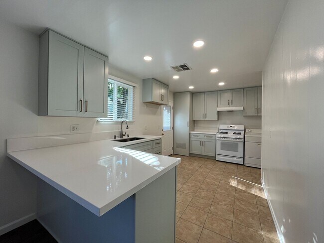 Building Photo - AVAILABLE NOW! Upgraded 3+1.5 w/backyard, ...