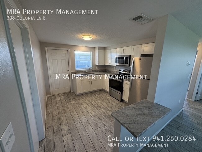 Building Photo - 308 Colonia Ln E