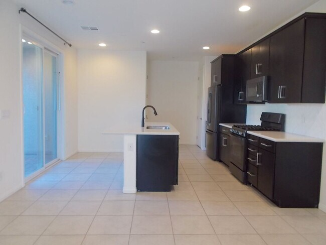 Building Photo - Spacious 3-Bedroom, 2-Story Townhome with ...