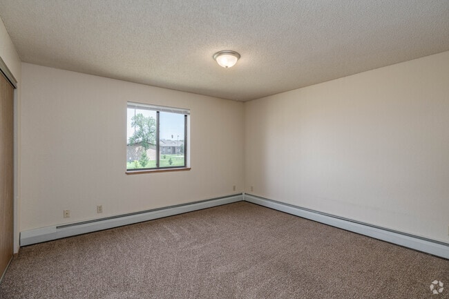 2BR,1BA - 750SF - Primary Bedroom - Gray Hawk Apartments