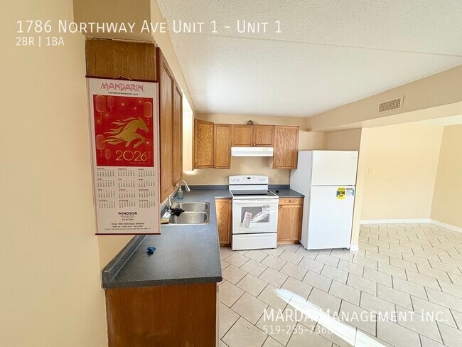 Photo du bâtiment - SPACIOUS 2 BED/1 BATH MODERN LOWER LEVEL SUITE! +HYDRO, GAS & WATER!