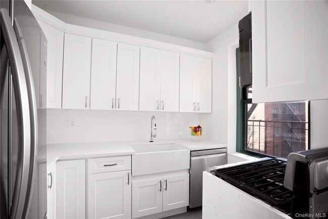 Building Photo - 34-40-40 79th St