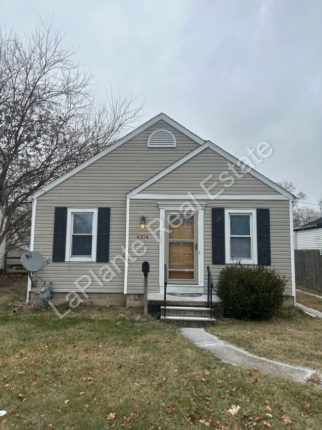 Primary Photo - Charming 3-Bedroom Home with Finished Base...