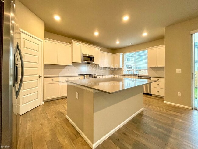 Foto del edificio - 4 br, 2.5 bath House - 3124 14th Ave Ct NW -