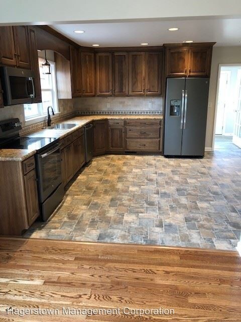 Foto del edificio - 5 br, 2 bath House - 18133 Maugans Ave.