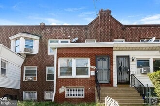 Building Photo - 7037 Elmwood Ave