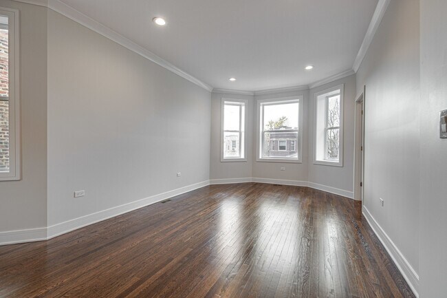 Building Photo - 719 N Homan Ave
