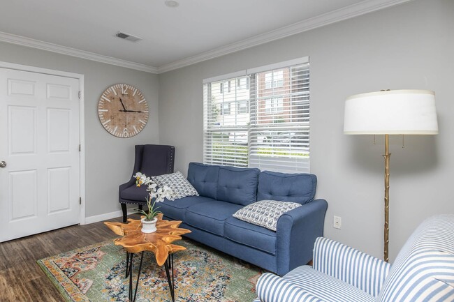 Welcome to Riverwood Park Apartments, where style meets comfort. Enjoy a beautifully designed living space with cozy furnishings and abundant natural light. Make this inviting home yours today—schedule a tour to see it for yourself! - Riverwood Park Apartments