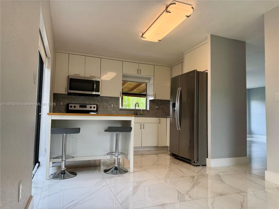Photo - 12705 SW 66th Terr Drive 12705, Miami, FL 33183