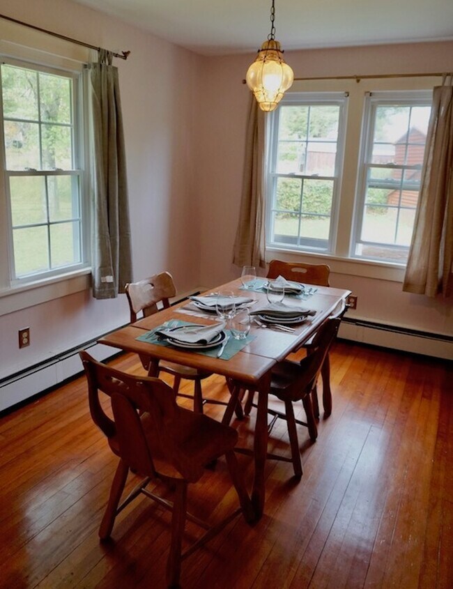 The dining room with plenty of light - 1957 County Road 3