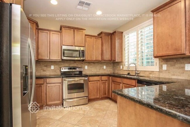 Building Photo - 9238 W Meadow Dr